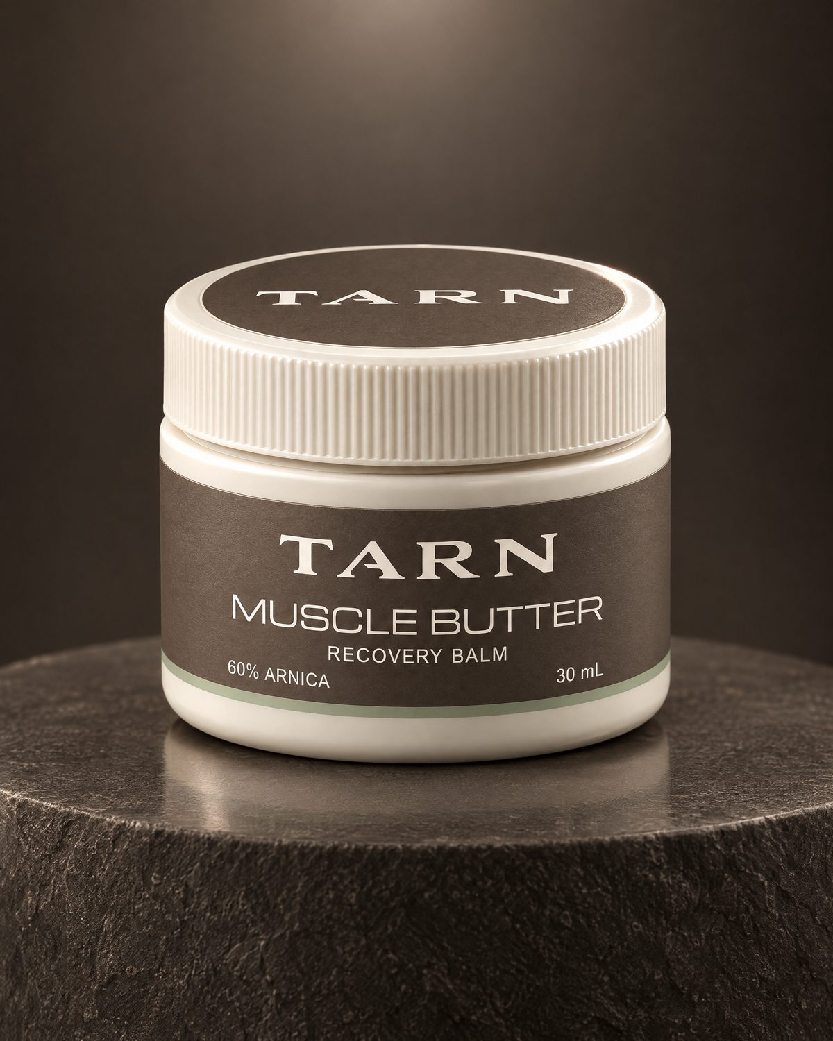 TARN Muscle Butter, one 30 mL jar on a stone plinth